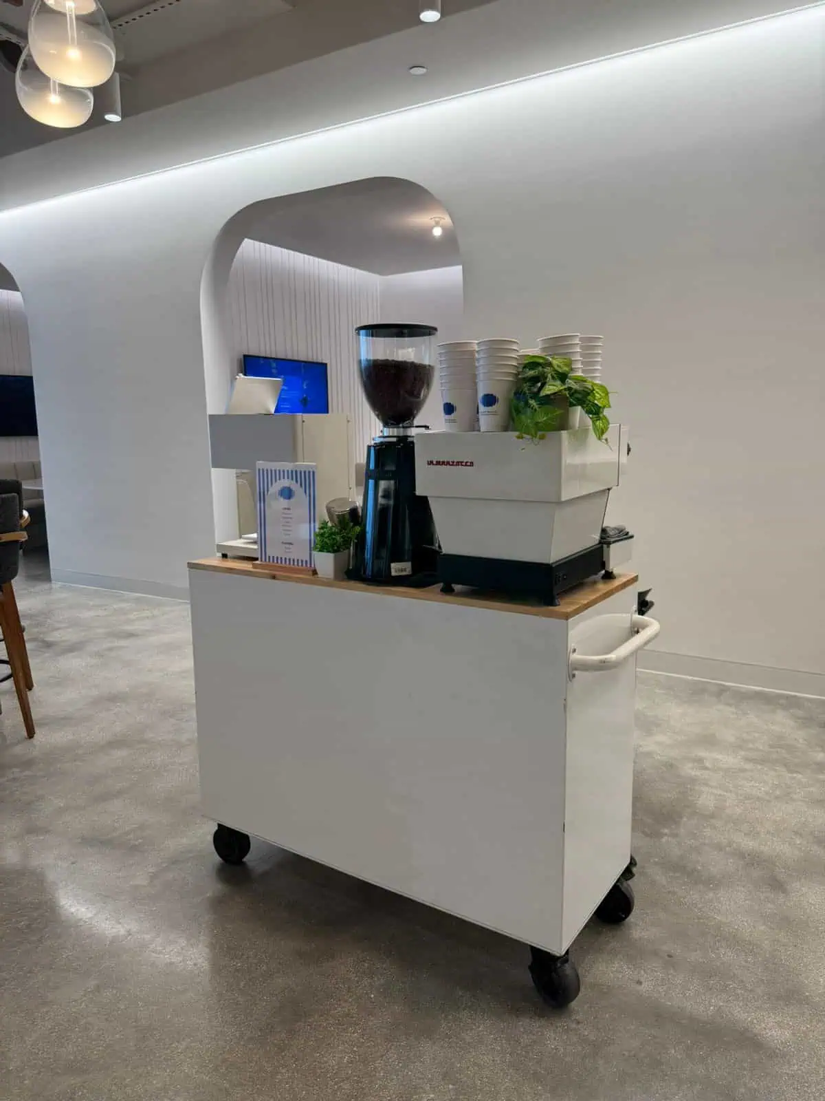 Barista serving coffee at a corporate event in Miami