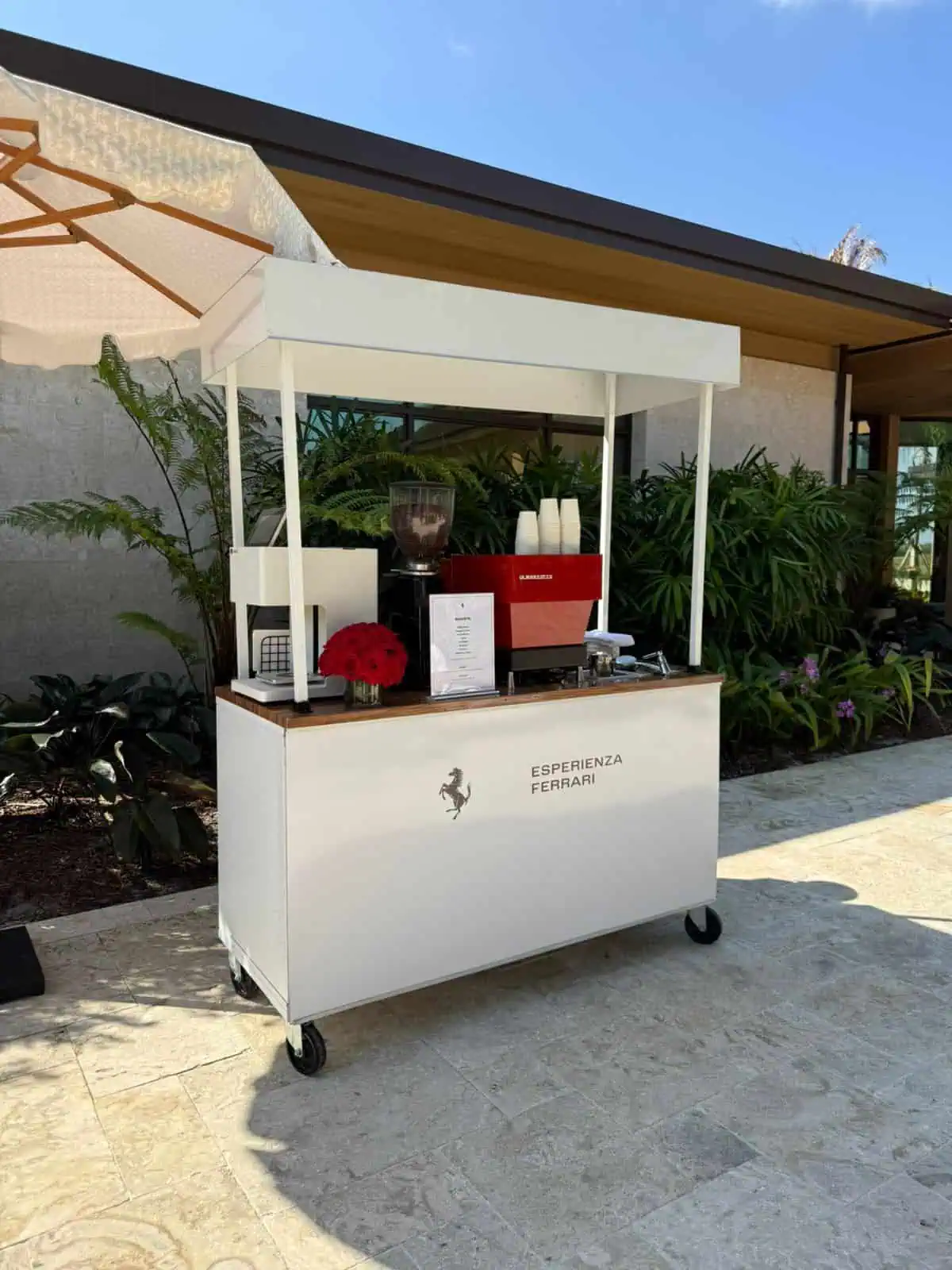 Ferrari branded coffee cart at a Miami activation
