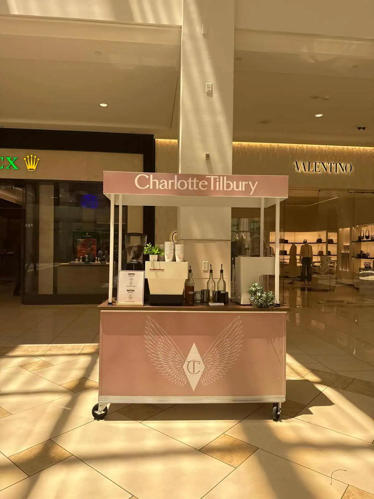 Charlotte Tilbury branded coffee cart in Miami